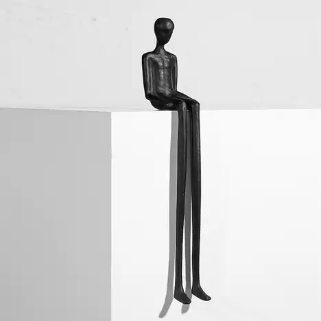 Edge Sitting Long-Legged Black Figure Sculpture - Image 2